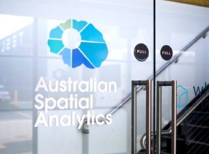 Close up image of the front door to the offices of Australian Spatial Analytics, their logo is shown