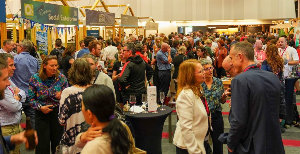 A room full of people networking and collaborating over drinks at the Social Enterprise World Forum 2022